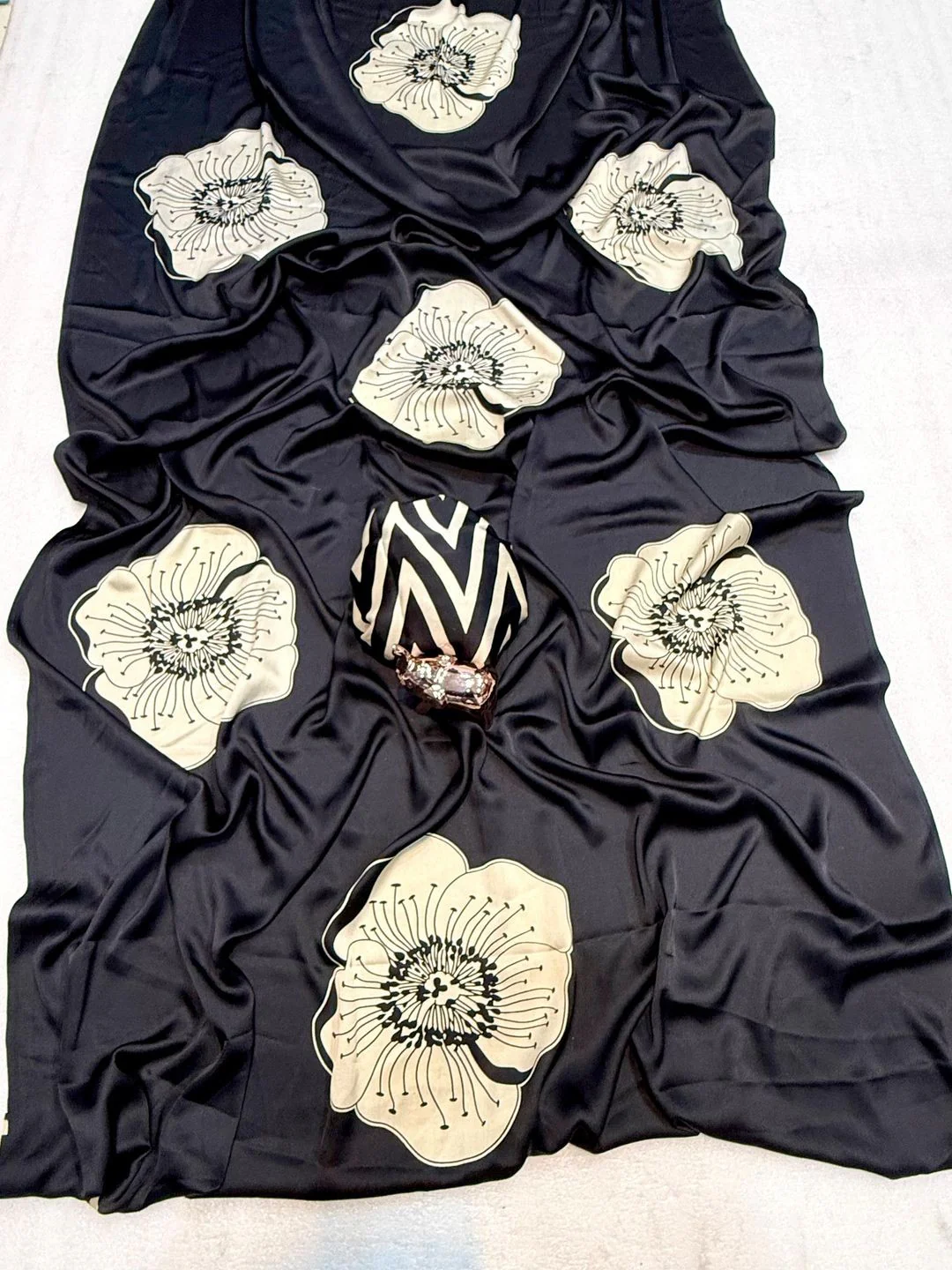 Timeless elegance in this black satin saree adorned with delicate floral prints - Image 3
