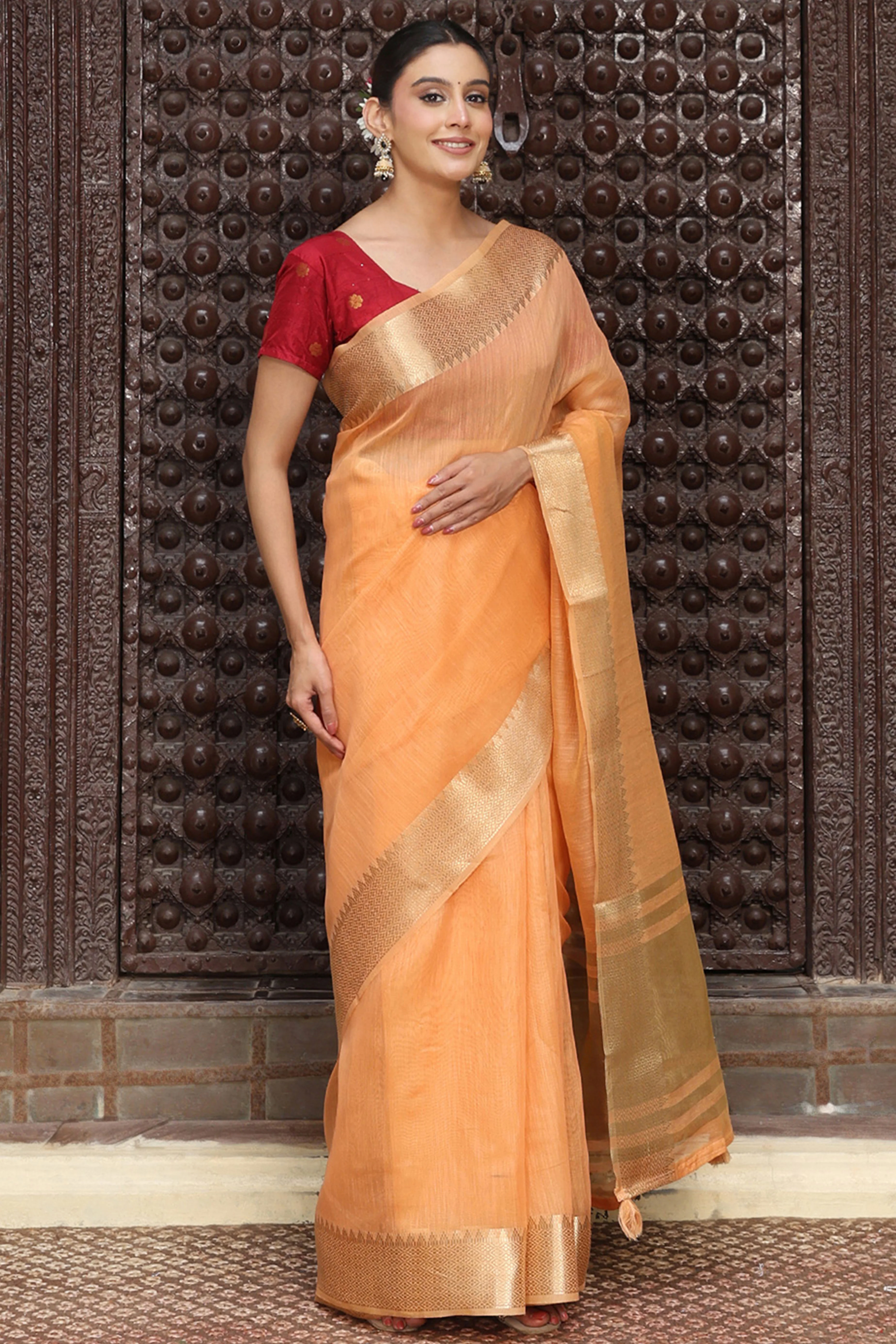 Trendy Orange Cotton Blend Saree Showcasing Elegant Zari Weaving & Tassel Border Pallu - Image 4
