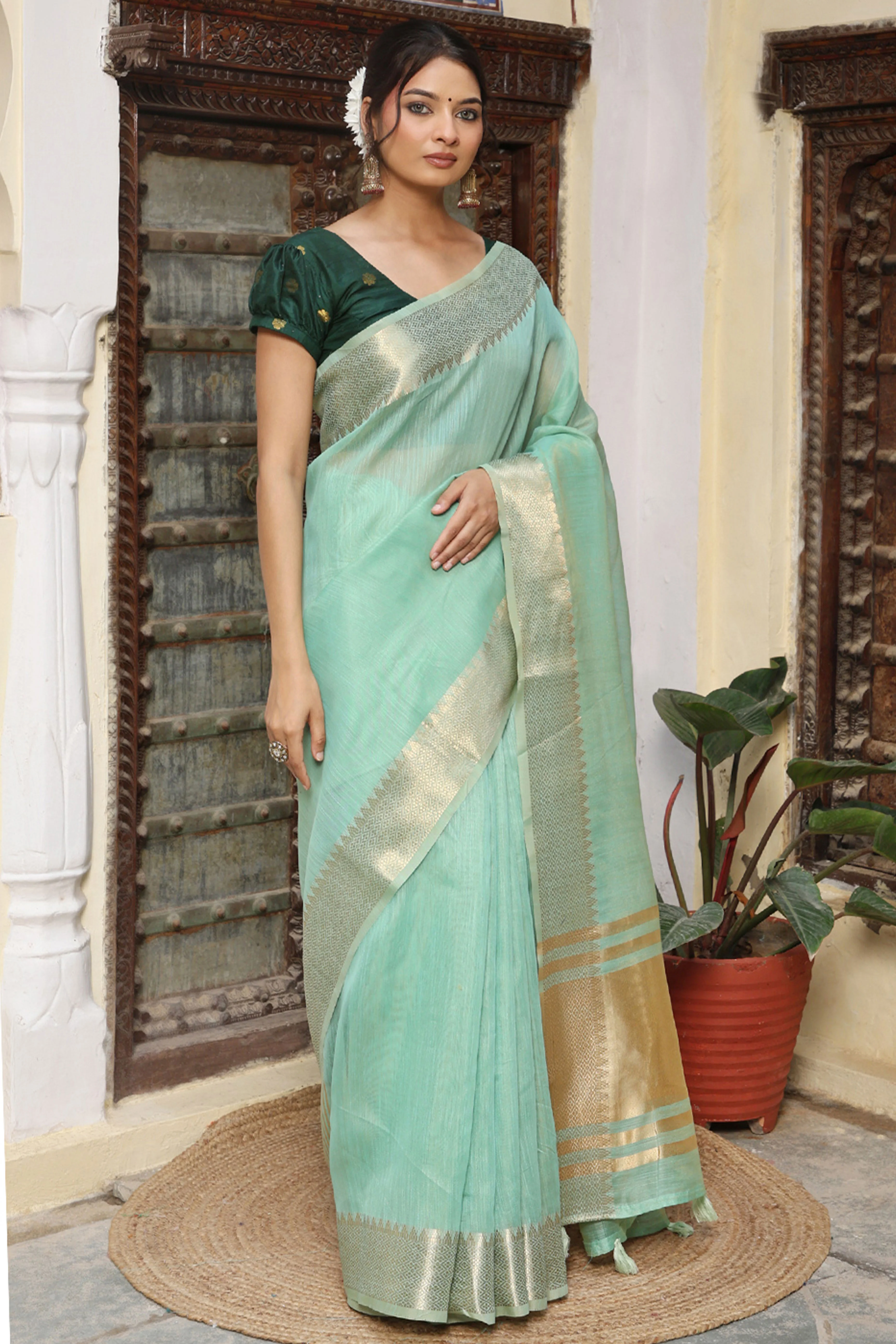 Trendy Turquoise Cotton Blend Saree Showcasing Elegant Zari Weaving & Tassel Border Pallu - Image 4