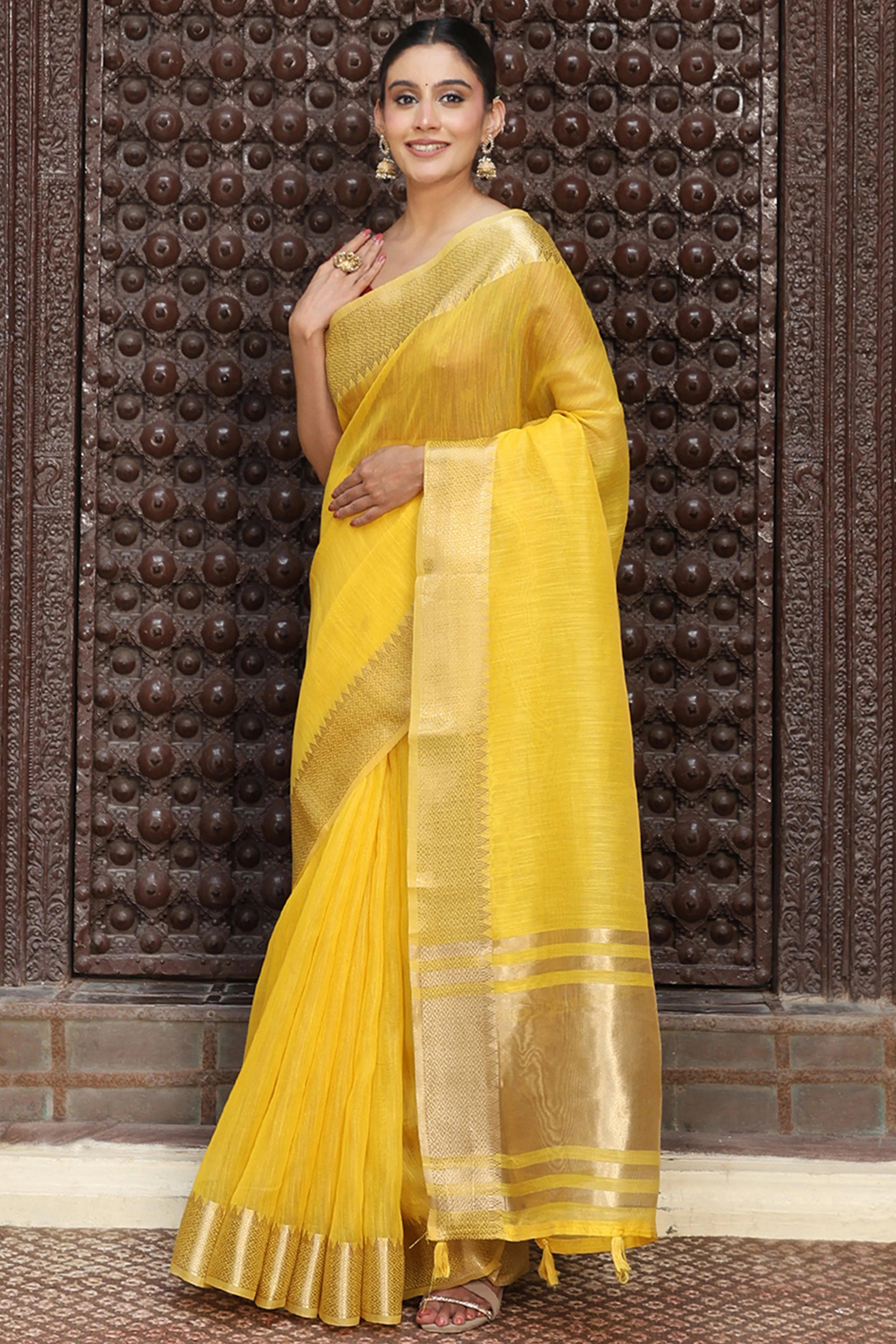 Trendy Yellow Cotton Blend Saree Showcasing Elegant Zari Weaving & Tassel Border Pallu - Image 3