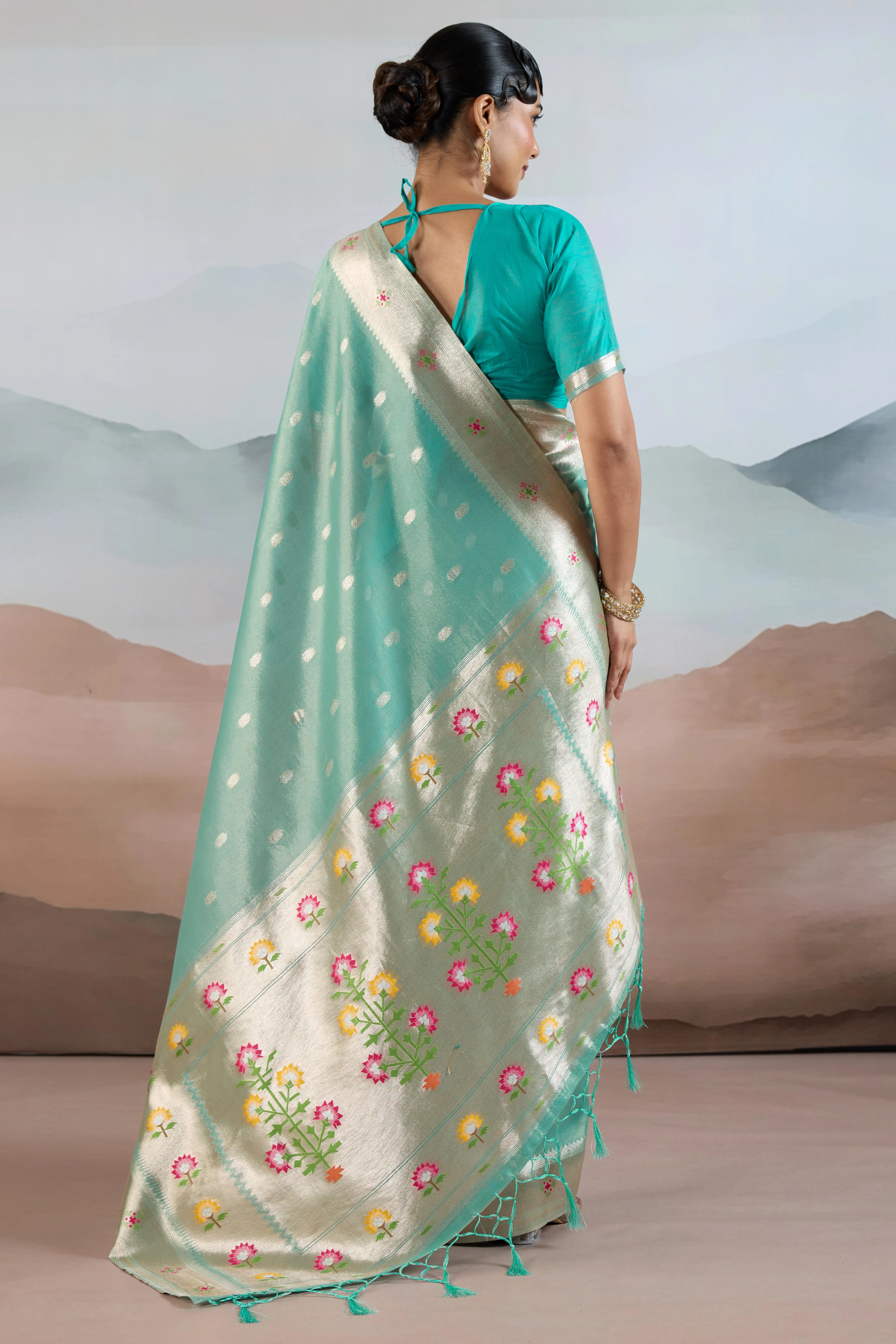 Turquoise Festive Tissue Saree Crafted with Artistic Zari Butti Weaving and a Featherlight Texture - Image 5