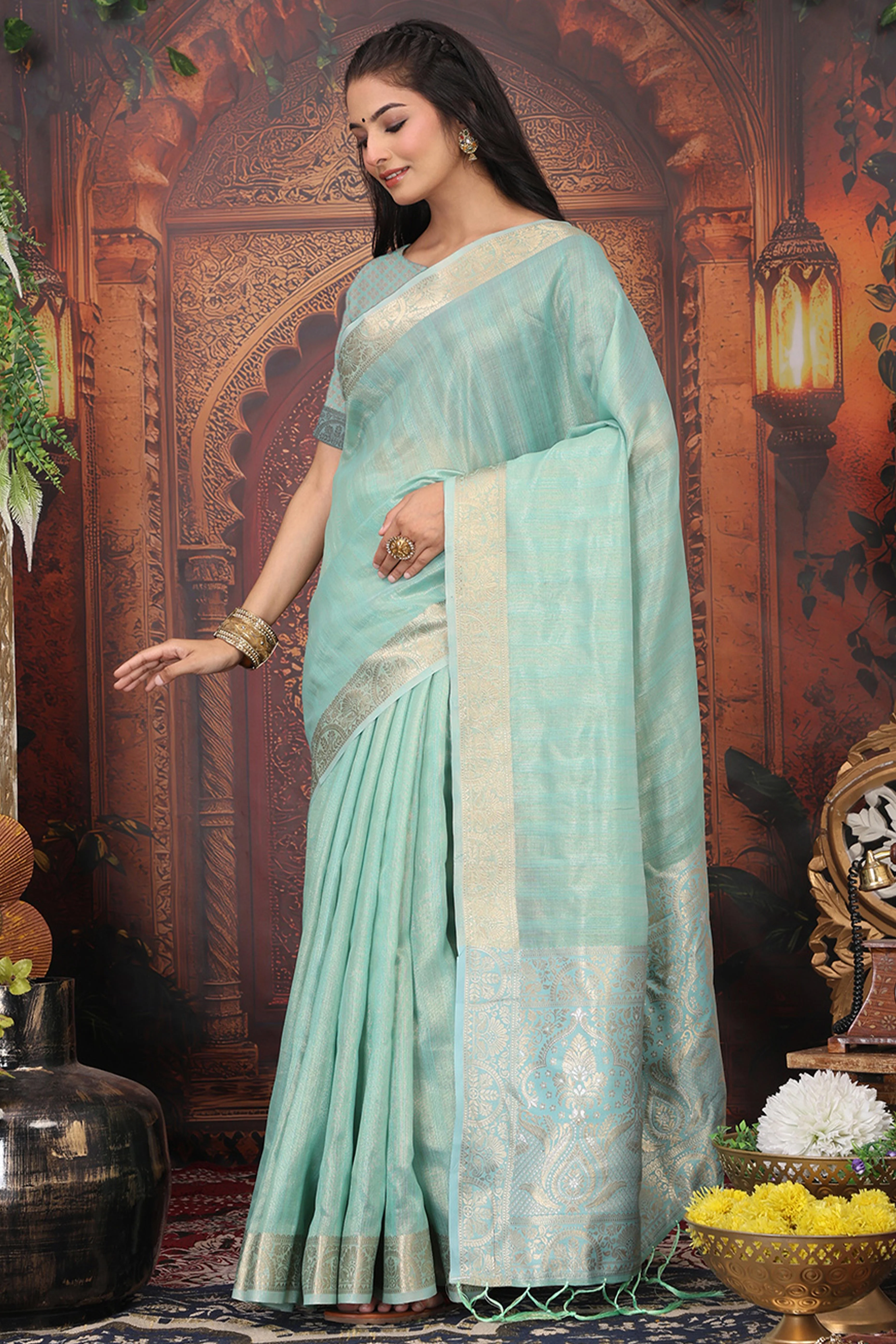 Turquoise Organza Saree Adorned With Floral Zari Weaving & Graceful Tassel Pallu - Image 4