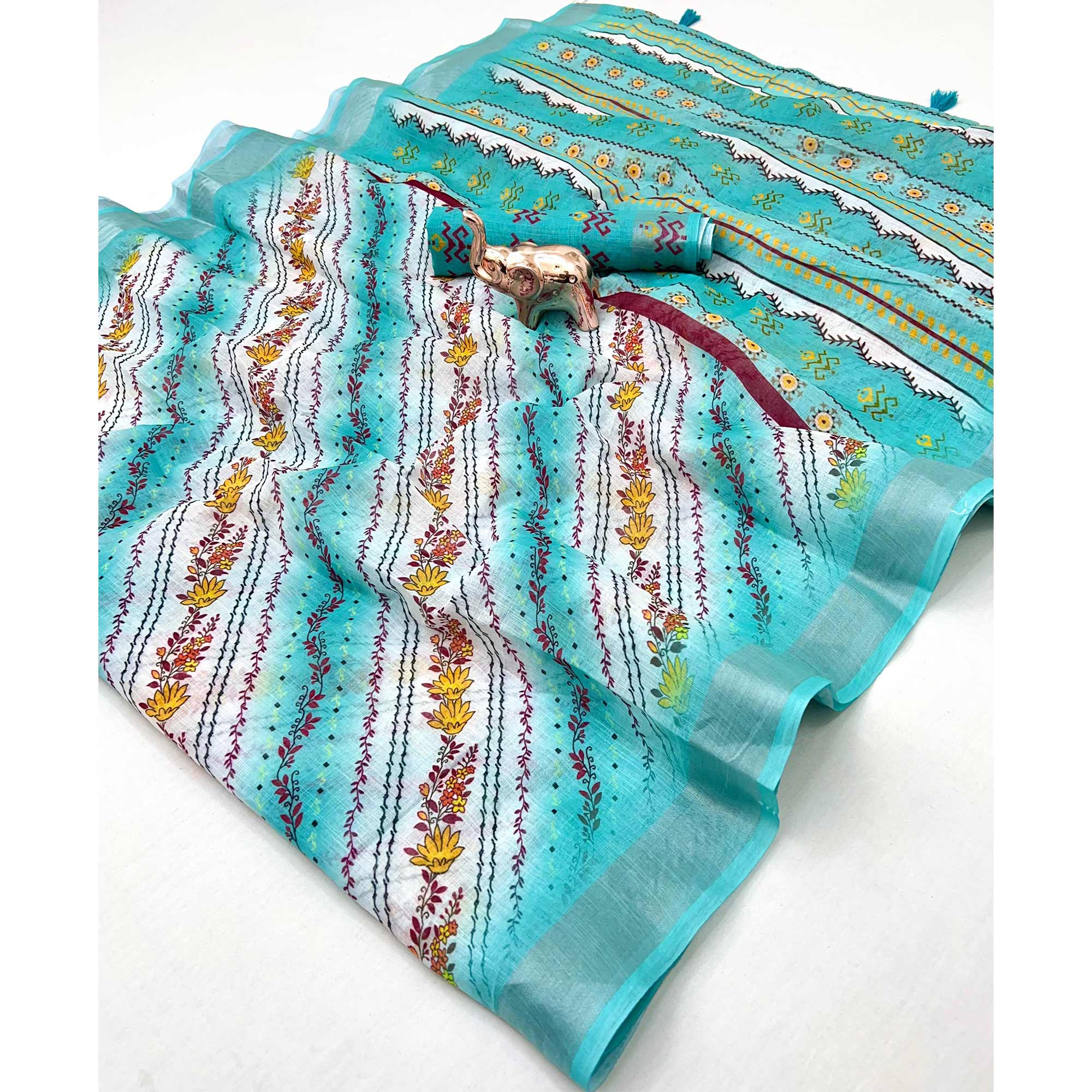 Turquoise Soft Linen Saree with Artistic Print Detailing - Image 3