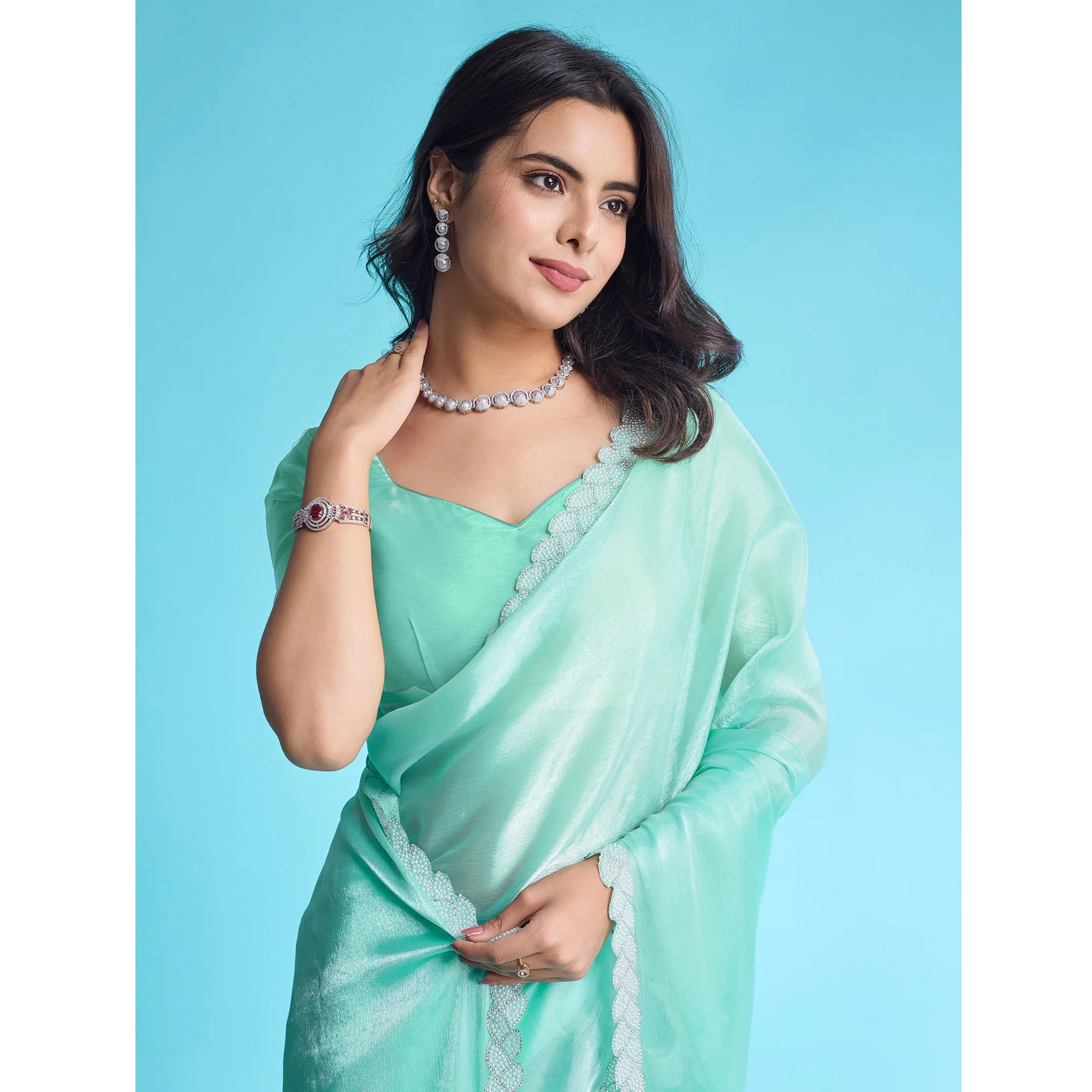 Turquoise Solid With Zarkan & Ceramic Pearl Diamond Lace Tissue Saree - Image 7