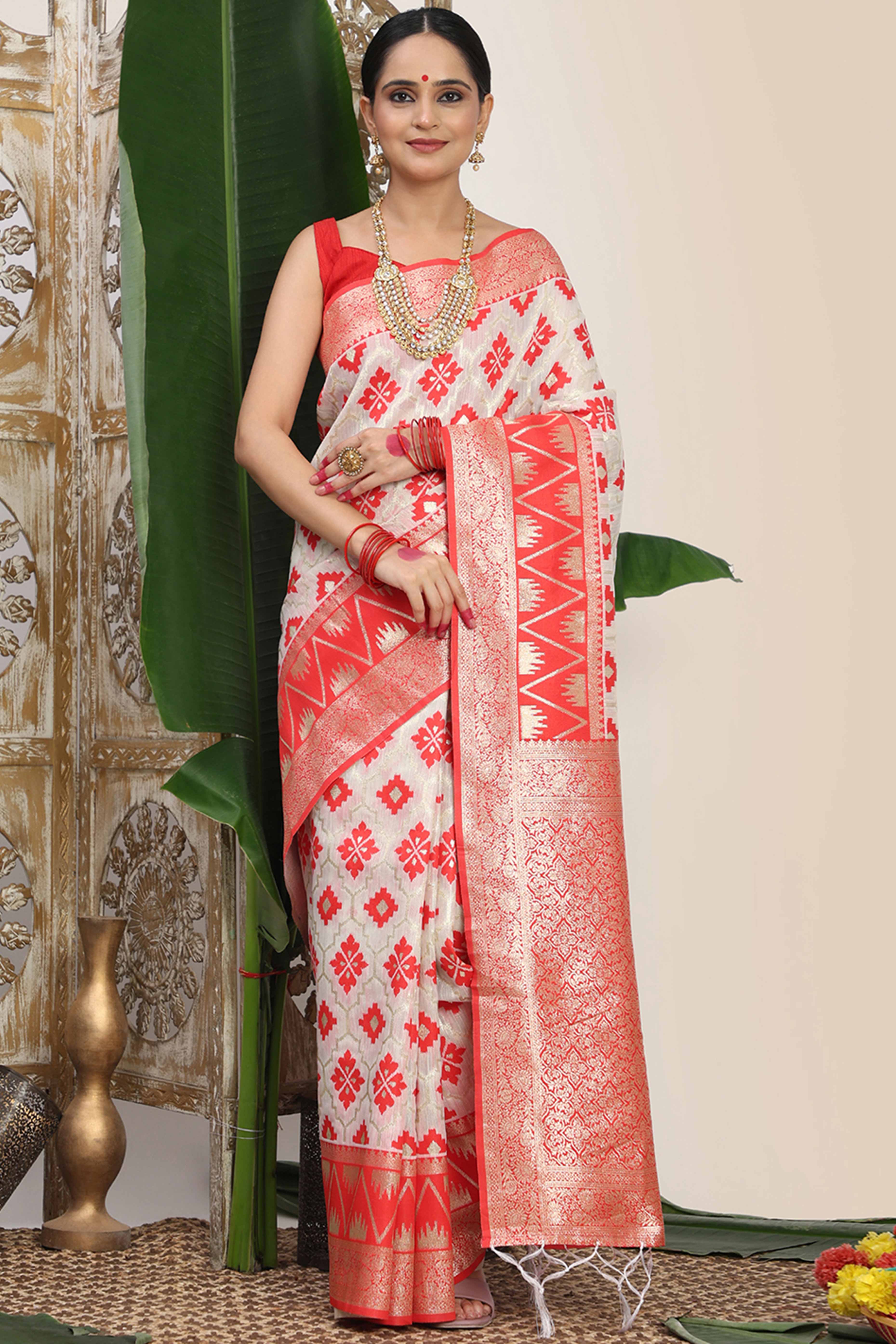 Vibrant White & Red  Linen Cotton Saree Featuring Timeless Zari Weaving And Elegant Tassel Pallu