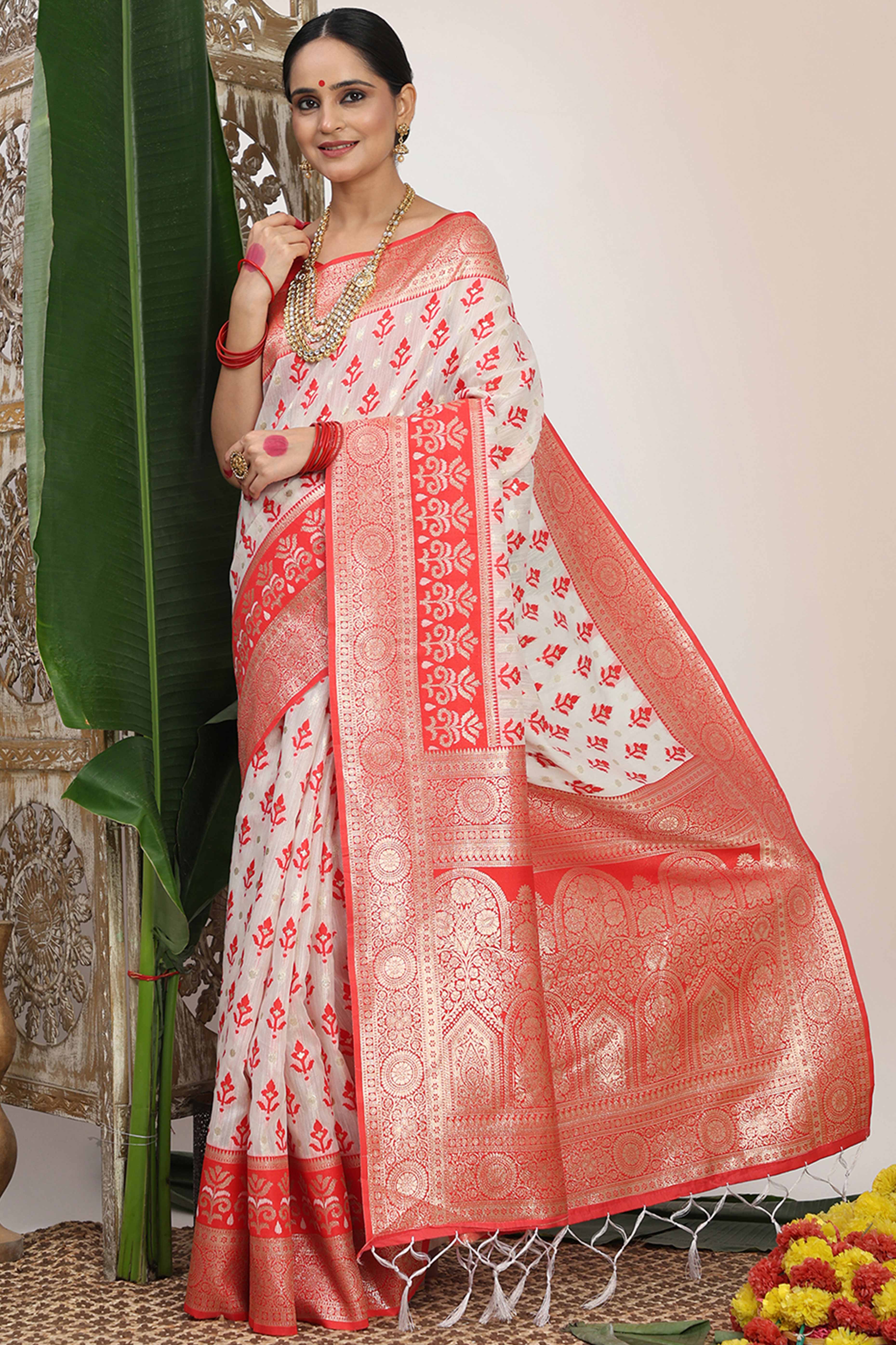 White & Red Linen Cotton Saree Showcasing Elegant Zari Weaving And A Tassel-Embellished Pallu - Image 5