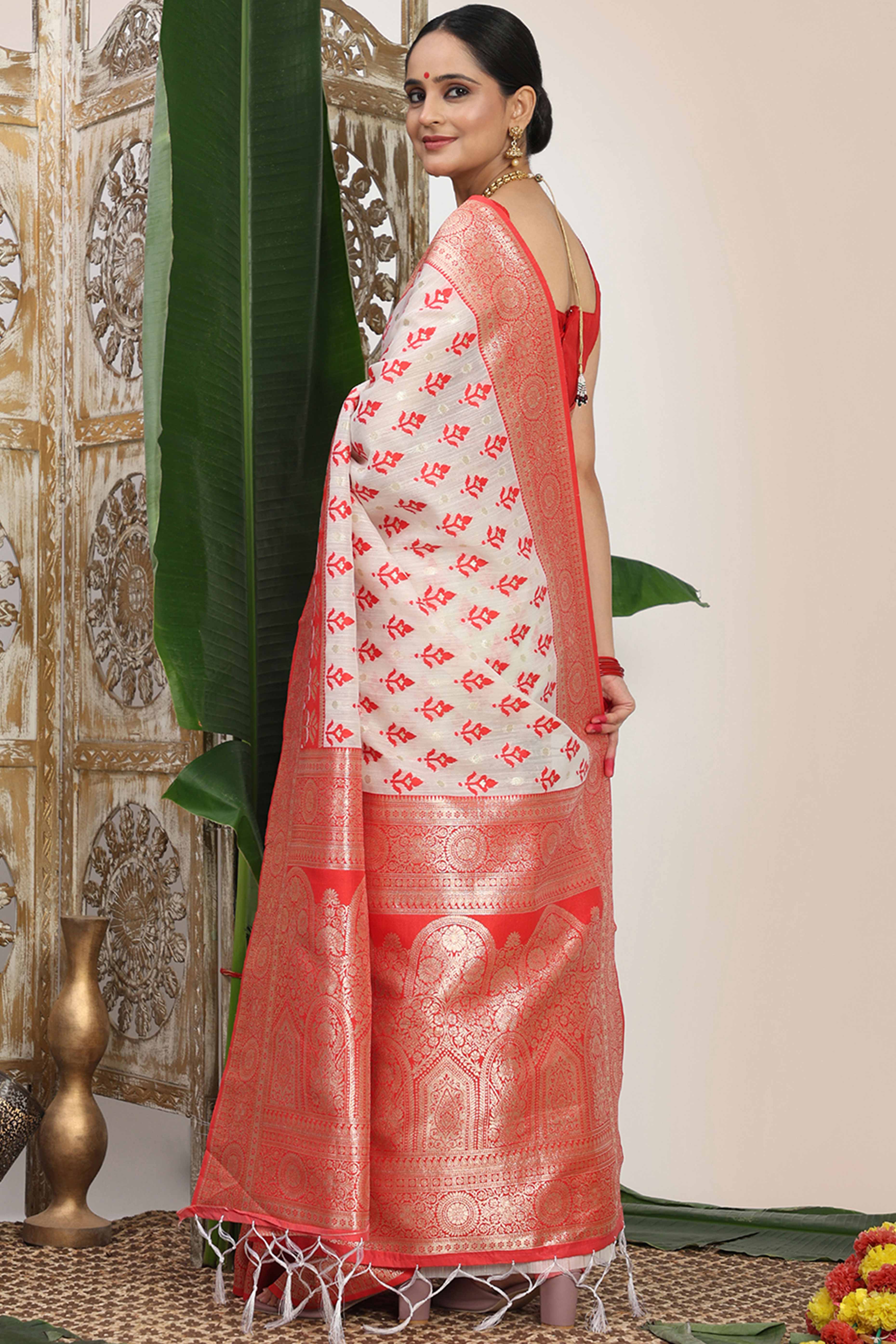 White & Red Linen Cotton Saree Showcasing Elegant Zari Weaving And A Tassel-Embellished Pallu - Image 6