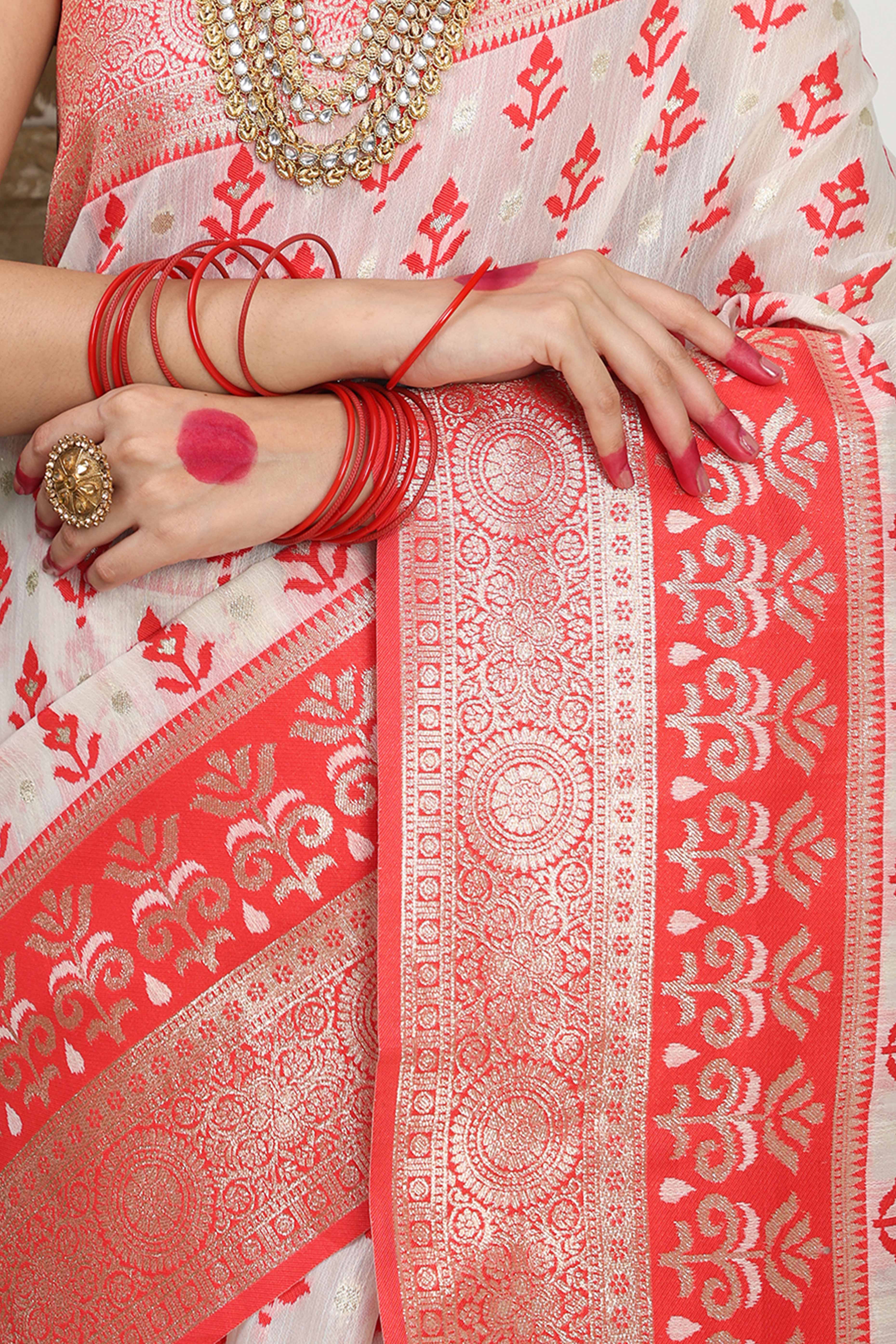 White & Red Linen Cotton Saree Showcasing Elegant Zari Weaving And A Tassel-Embellished Pallu - Image 8