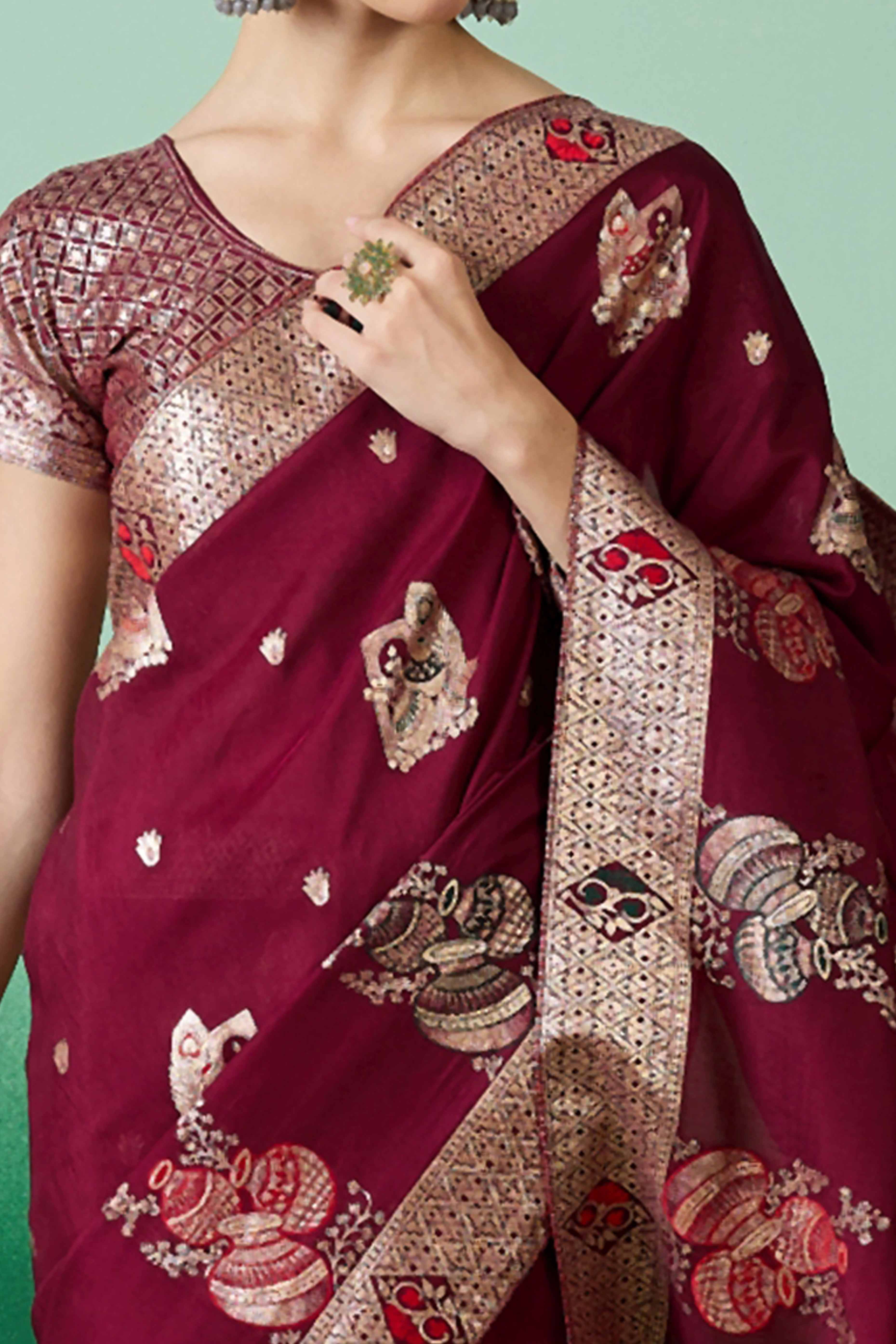 Wine Cotton Blend Saree Adorned With Floral Zari Weaving & Soft Tassel Accents - Image 2